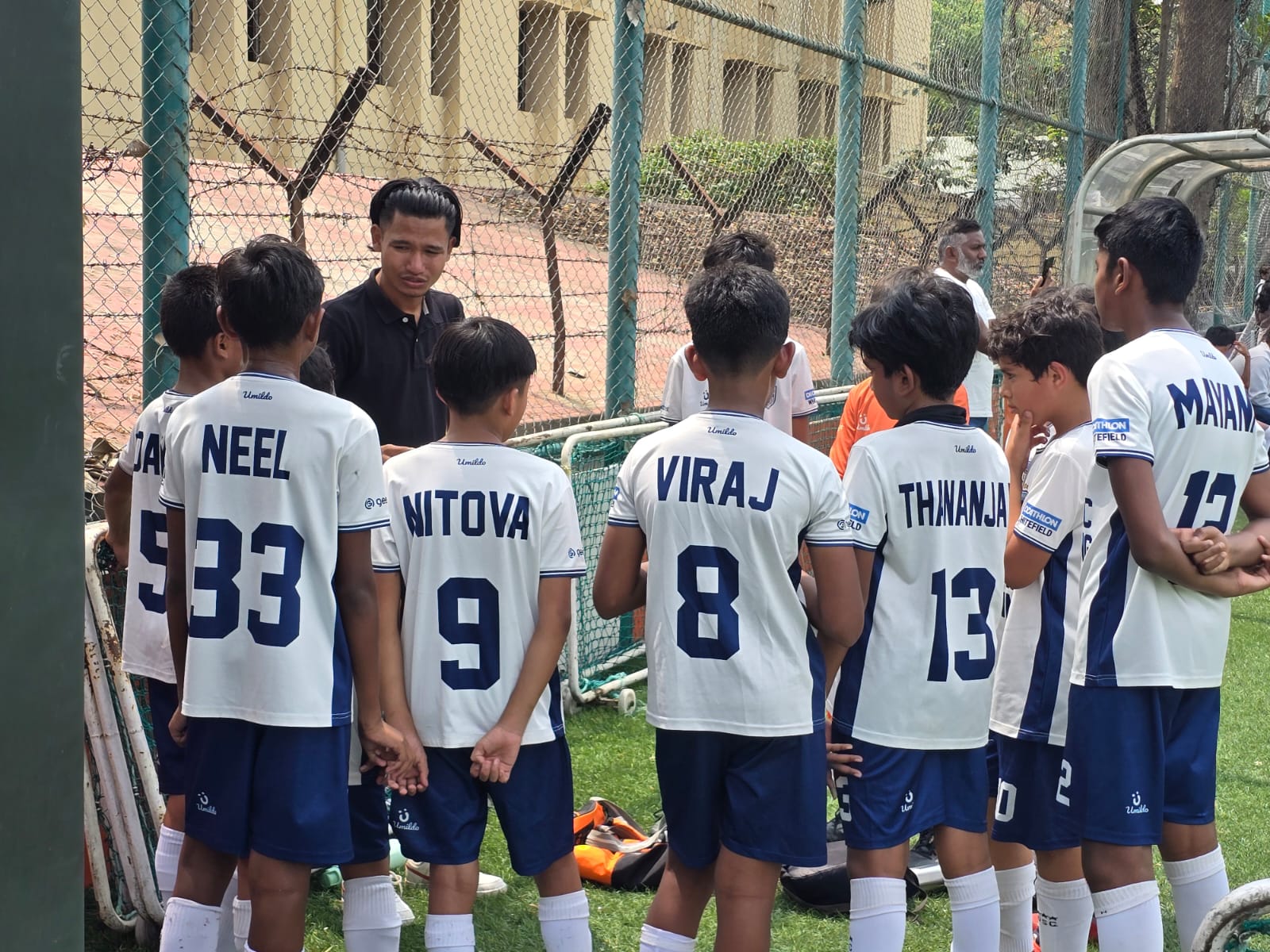 Youth Development Program team huddle